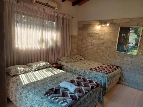 En eller flere senge i et værelse på La Casa