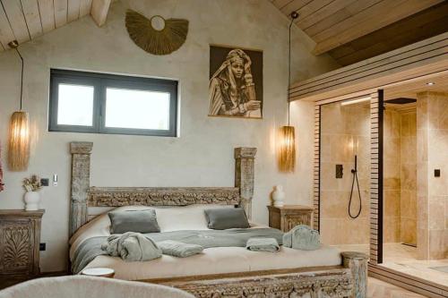 Ένα ή περισσότερα κρεβάτια σε δωμάτιο στο La suite Hindi