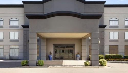 a rendering of the front of a building at Townhome Inn & Suites by IHG in Cordova
