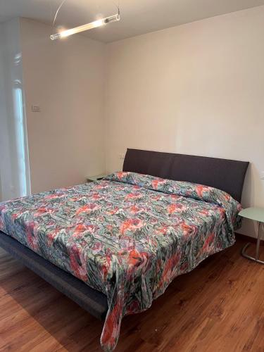 En eller flere senge i et værelse på Appartamento Family Park2