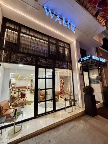 a store front of a furniture store with a sign on it at Wame Suite Hotel Nisantasi in Istanbul