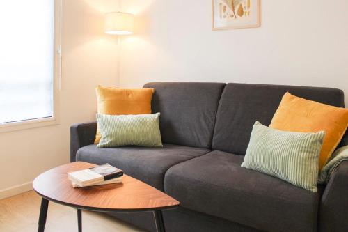 Et opholdsområde på Charming 28 m Love Nest in Vanves