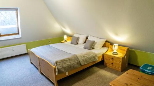 Postel nebo postele na pokoji v ubytování CarpeDiem