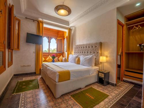 Postel nebo postele na pokoji v ubytování Riad RAM