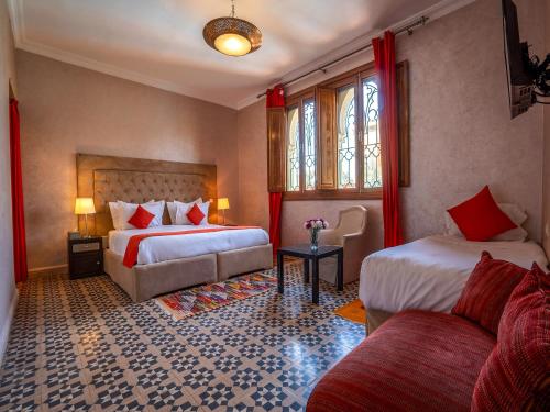 Postel nebo postele na pokoji v ubytování Riad RAM