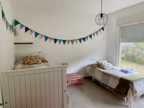 En eller flere senge i et værelse på Chalet en Pinar del Golf