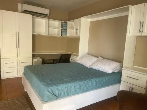 Postel nebo postele na pokoji v ubytování Condominio albatros