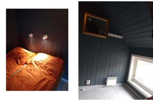 een slaapkamer met een bed en een raam in een kamer bij Larsen Rorbu Lofoten in Napp