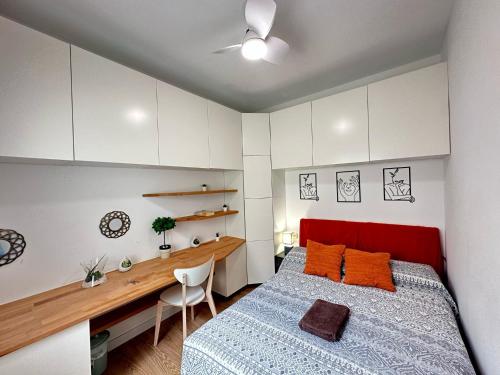 Giường trong phòng chung tại Alojamiento Borrell