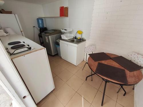 Kuchyň nebo kuchyňský kout v ubytování Depto interior Full equipado, excelente sector