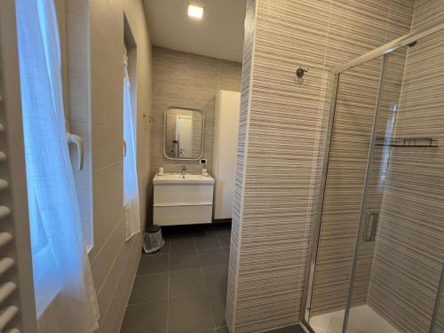 a bathroom with a sink and a shower at Il Rifugio in Sulmona