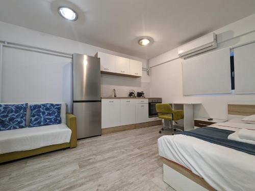 Η κουζίνα ή μικρή κουζίνα στο Cozy Studio w King-Size Bed