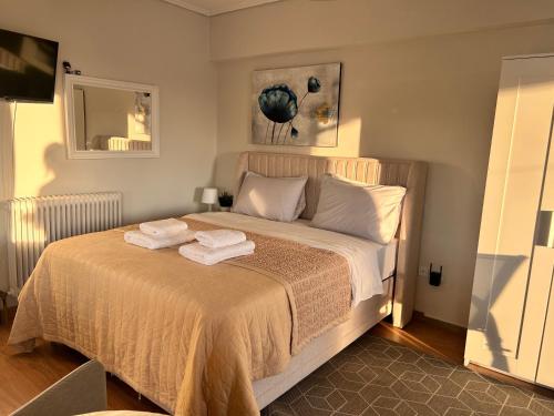 Postel nebo postele na pokoji v ubytování Top floor apartment