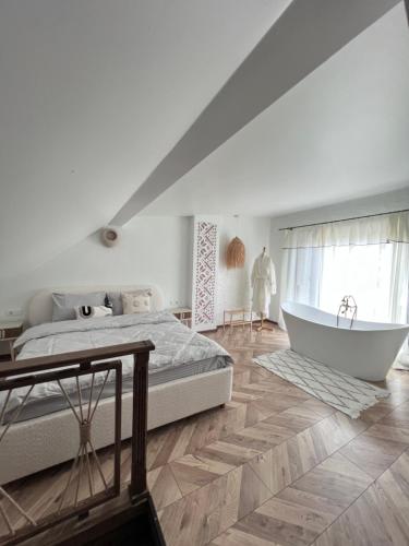 En eller flere senge i et værelse på Villa Pelahia