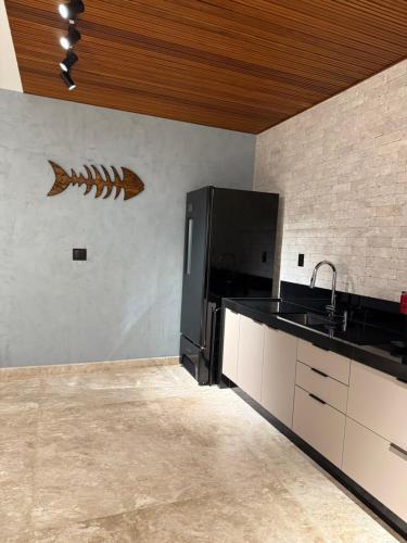 Kuchyň nebo kuchyňský kout v ubytování Casa Temporada Praia do Forte, Complexo Iberostate, 5 Suítes