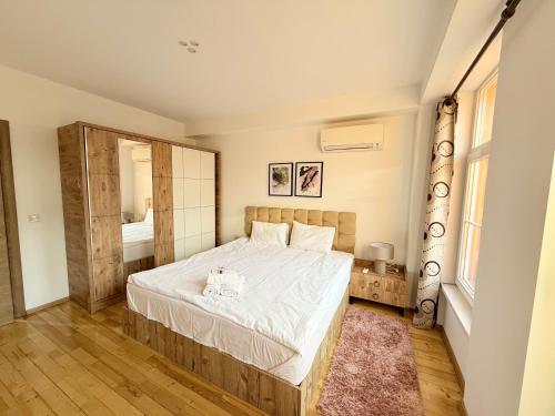 Postel nebo postele na pokoji v ubytování Central 2 Bedroom Apartments The Quiet Luxury 3