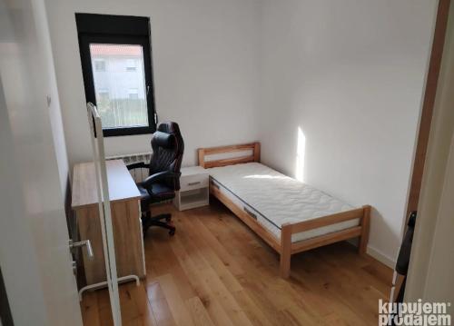 En eller flere senge i et værelse på Furkan Home