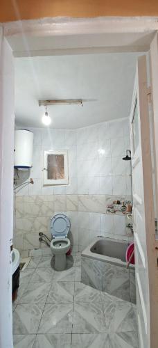 Koupelna v ubytování أراكِ قريبا صينين فقط