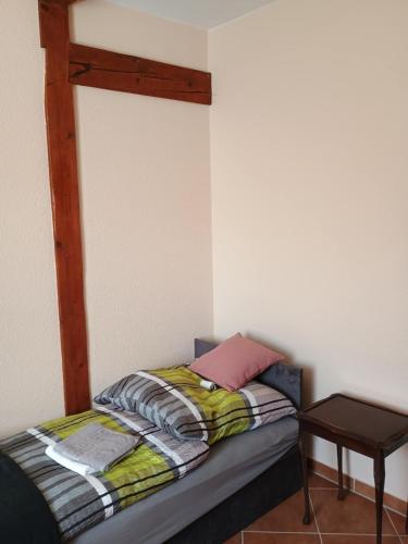 Postel nebo postele na pokoji v ubytování Noclegi Sówka