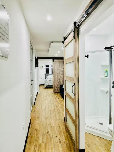 a hallway with a room with a closet and a bed at Casa Vagon Isla Bendita in La Gonzalez