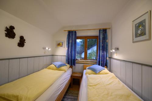 Postel nebo postele na pokoji v ubytování Ferienwohnungen Margreiter