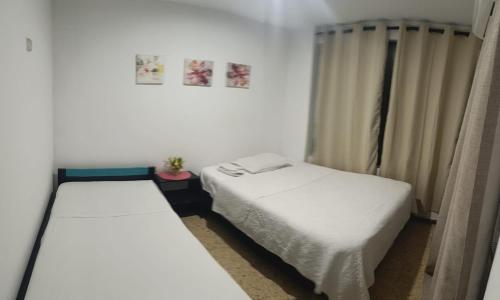 En eller flere senge i et værelse på Atlantis