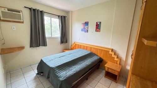 En eller flere senge i et værelse på Apartamentos Ecologic Park