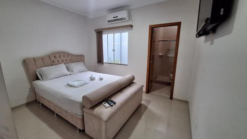 Postel nebo postele na pokoji v ubytování Casa Requinte