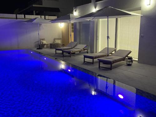 Bazén v ubytování יחידת נופש בוילה עם בריכה מחוממת nebo v jeho okolí