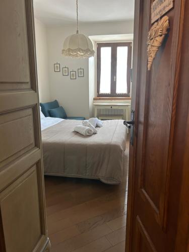 Postel nebo postele na pokoji v ubytování Colle House