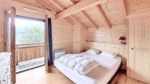 En eller flere senge i et værelse på Chalets à Saint Jean d'Aulps - Chalet Mont D'Evian MAE-4041