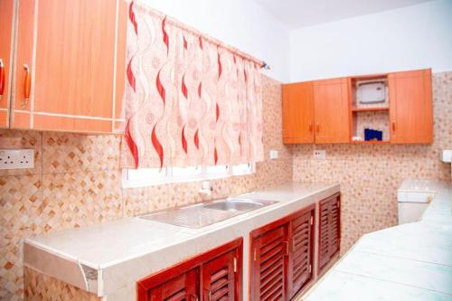 Kuchyň nebo kuchyňský kout v ubytování Brightstar Apartments Diani