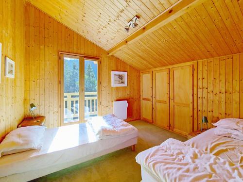 En eller flere senge i et værelse på Chalets à Châtel - Chalet Casimir CSM CHARMING & NATURE 10 Pers. MAE-3393