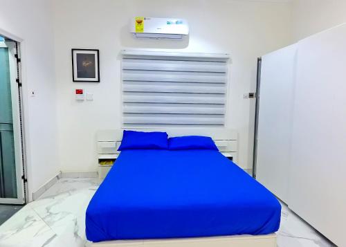 Llit o llits en una habitació de CB Apartment