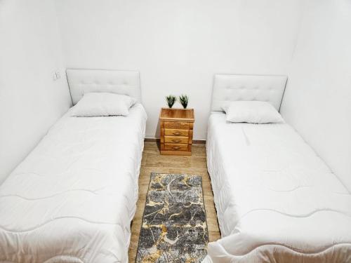 Cama o camas de una habitación en Sunset Ocean View