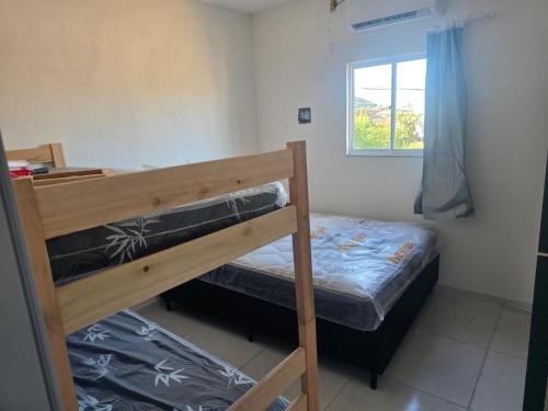 Ένα ή περισσότερα κρεβάτια σε δωμάτιο στο Residencial S A Canasvieiras