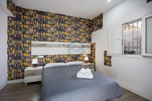 Кровать или кровати в номере La Terraza by Staycare