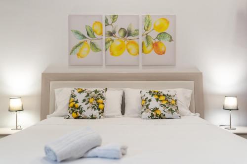 En eller flere senge i et værelse på Casa del Limone Lemonhousect