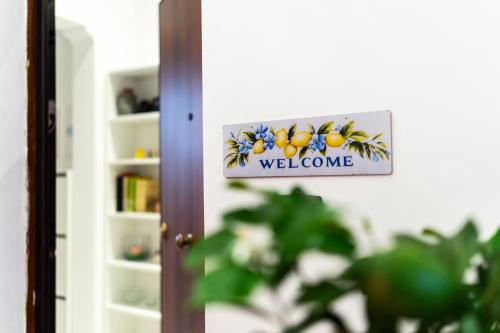 Et logo, certifikat, skilt eller en pris der bliver vist frem på Casa del Limone Lemonhousect