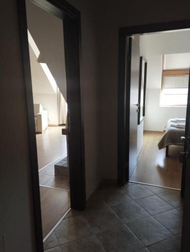 an open door to a room with a living room at Luxury Chalet in Borovets, Rila Views & Fireplace in Borovets