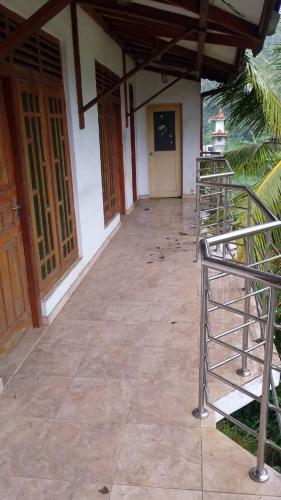 an empty hallway of a house with wooden doors at Artesa 