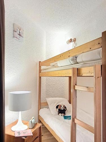 Postel nebo postele na pokoji v ubytování Résidence Meijotel - Studio pratique et trés bien équipé . Au pied des pistes . Centre station MAE-9443