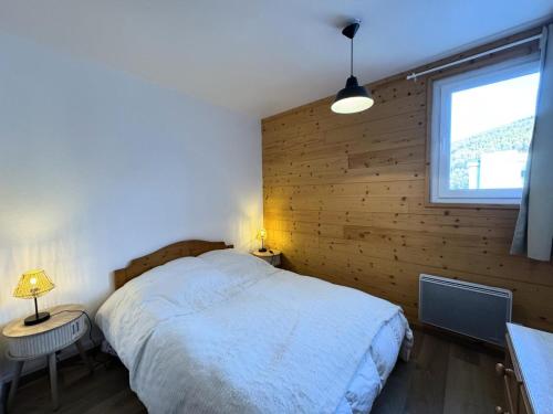 Ένα ή περισσότερα κρεβάτια σε δωμάτιο στο Résidence Le Seignon - Résidence Seignon, centre station MAE-7273