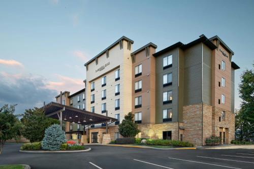 a rendering of a hotel with a parking lot at SpringHill Suites Pigeon Forge in Pigeon Forge