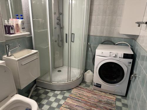 Koupelna v ubytování Tapulikaupunki Apartment Helsinki