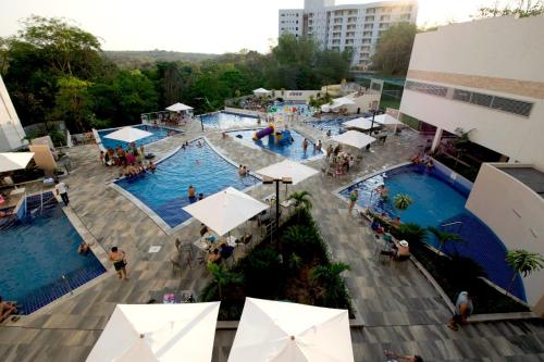 Swimmingpoolen hos eller tæt på Apartamentos Veredas Park - Rio Quente Goias