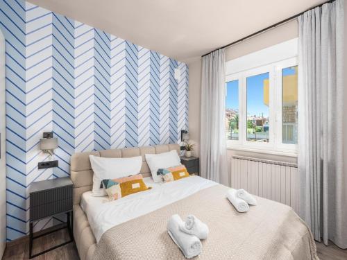 Postel nebo postele na pokoji v ubytování Stylish Umag Villa Just 200 m from the Sea