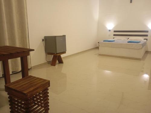 TV a/nebo společenská místnost v ubytování Hotel Asha safari