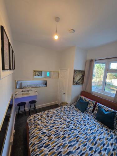 En eller flere senge i et værelse på Aura - 8ight Havens Folkestone