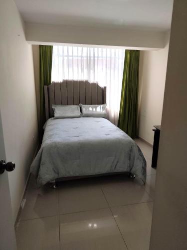 En eller flere senge i et værelse på La casa de Betty